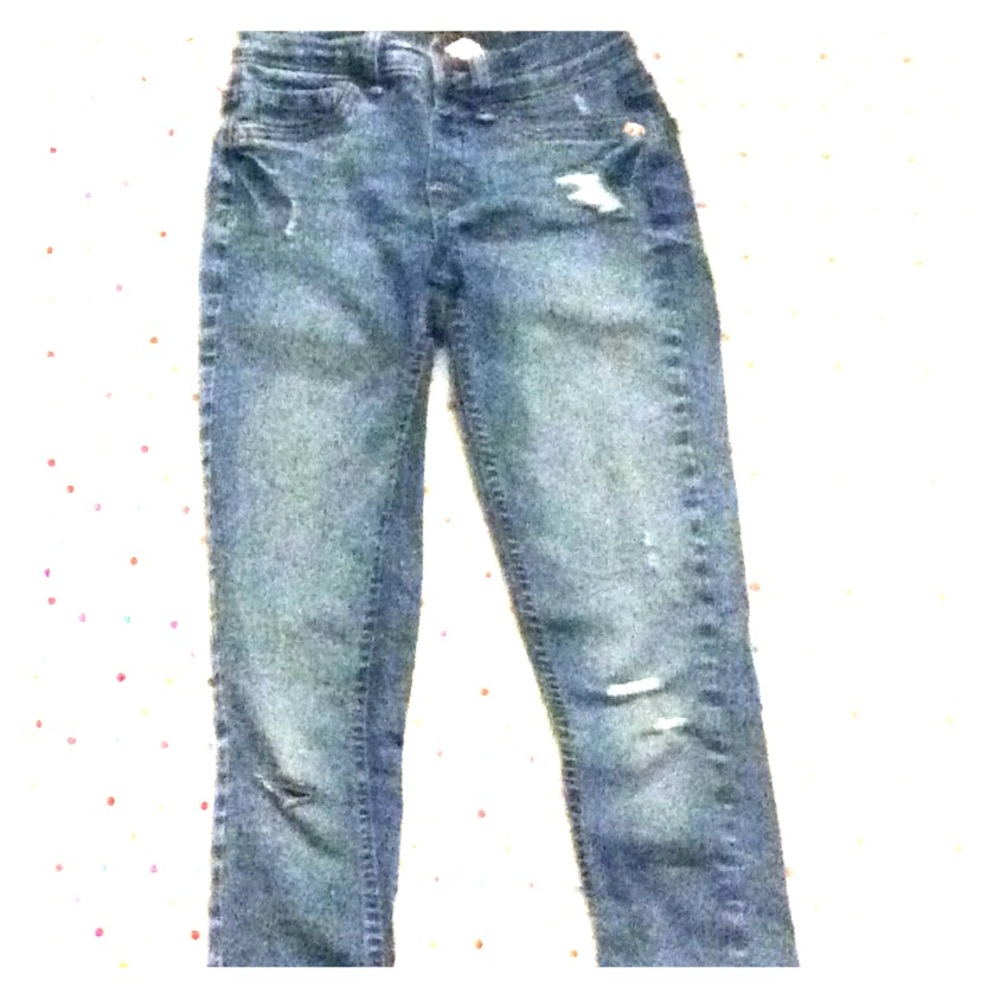 Ripped light washed mid rise jeggings